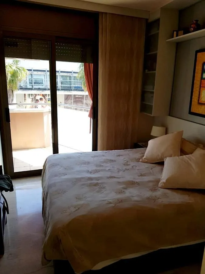 Seaside Terrace Apartment: Beachfront Living with City Views Platja d'Aro Apartment
